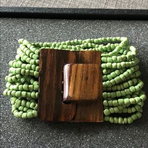 Multi strand beads bracelet with wood clasp